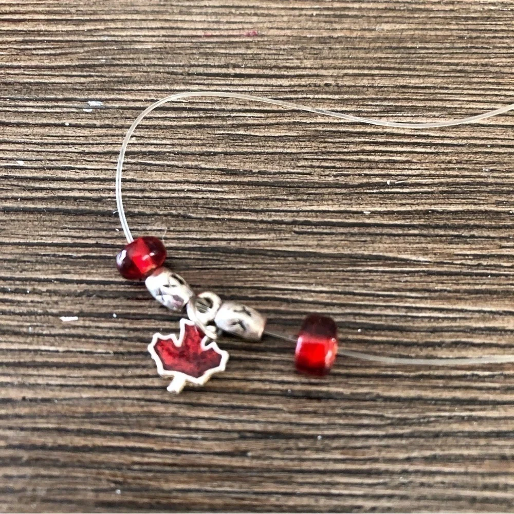Handmade floating leaf and red beaded necklace